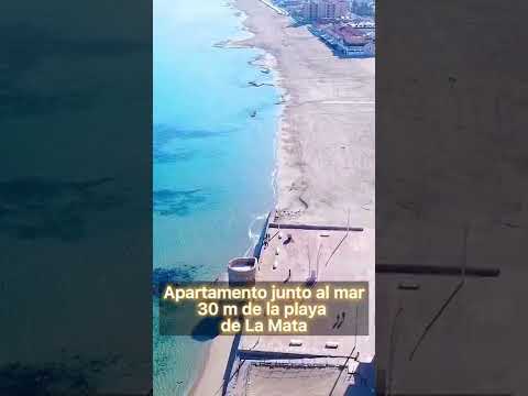 Apartamento playa 🌴 Propiedad junto al mar 30m de la playa de La Mata en Torrevieja #shorts